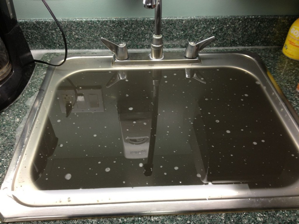 backed up kitchen sink broken garbbbbodge disposel